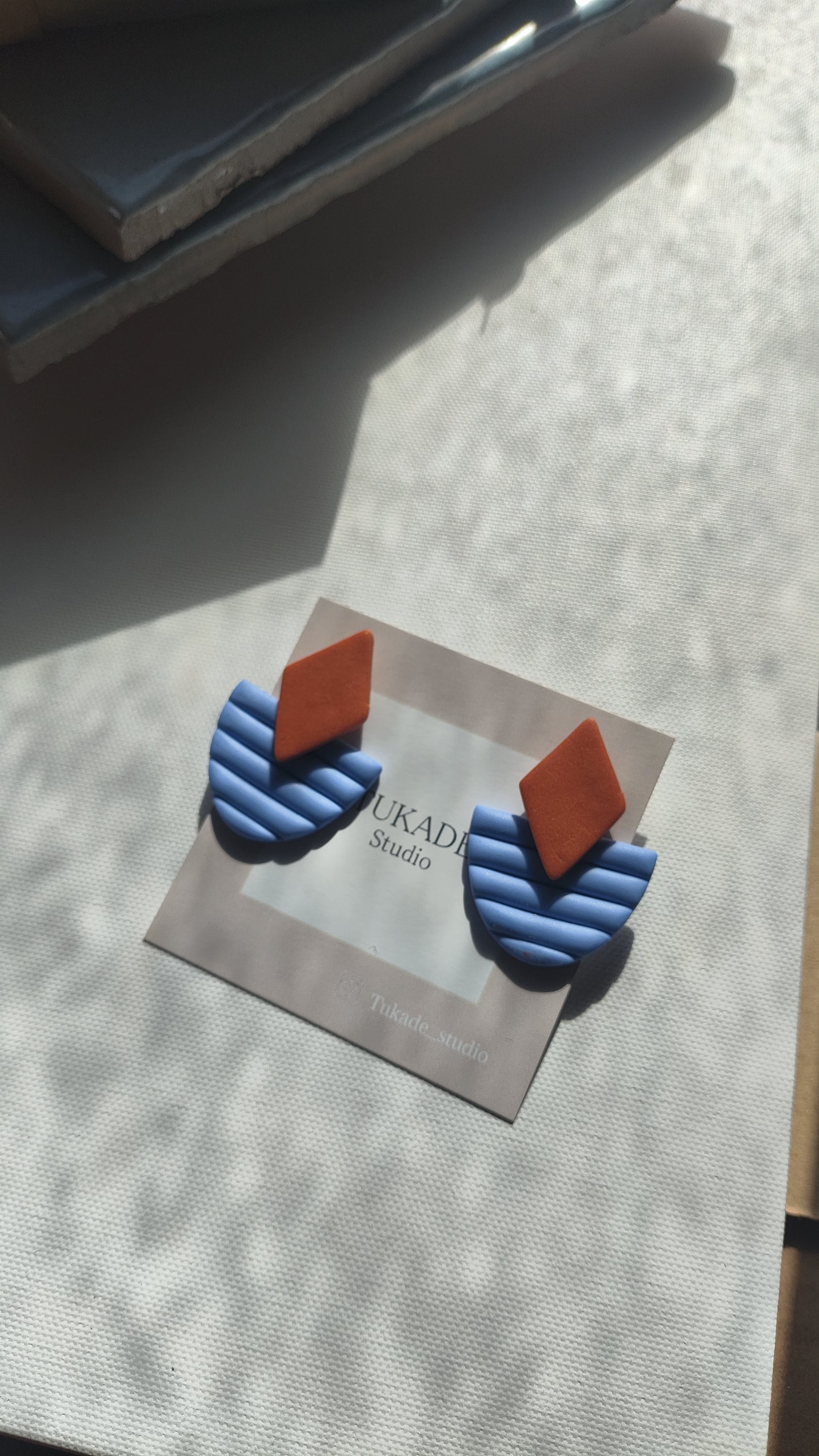 FELISA azul lavanda y teja-naranja