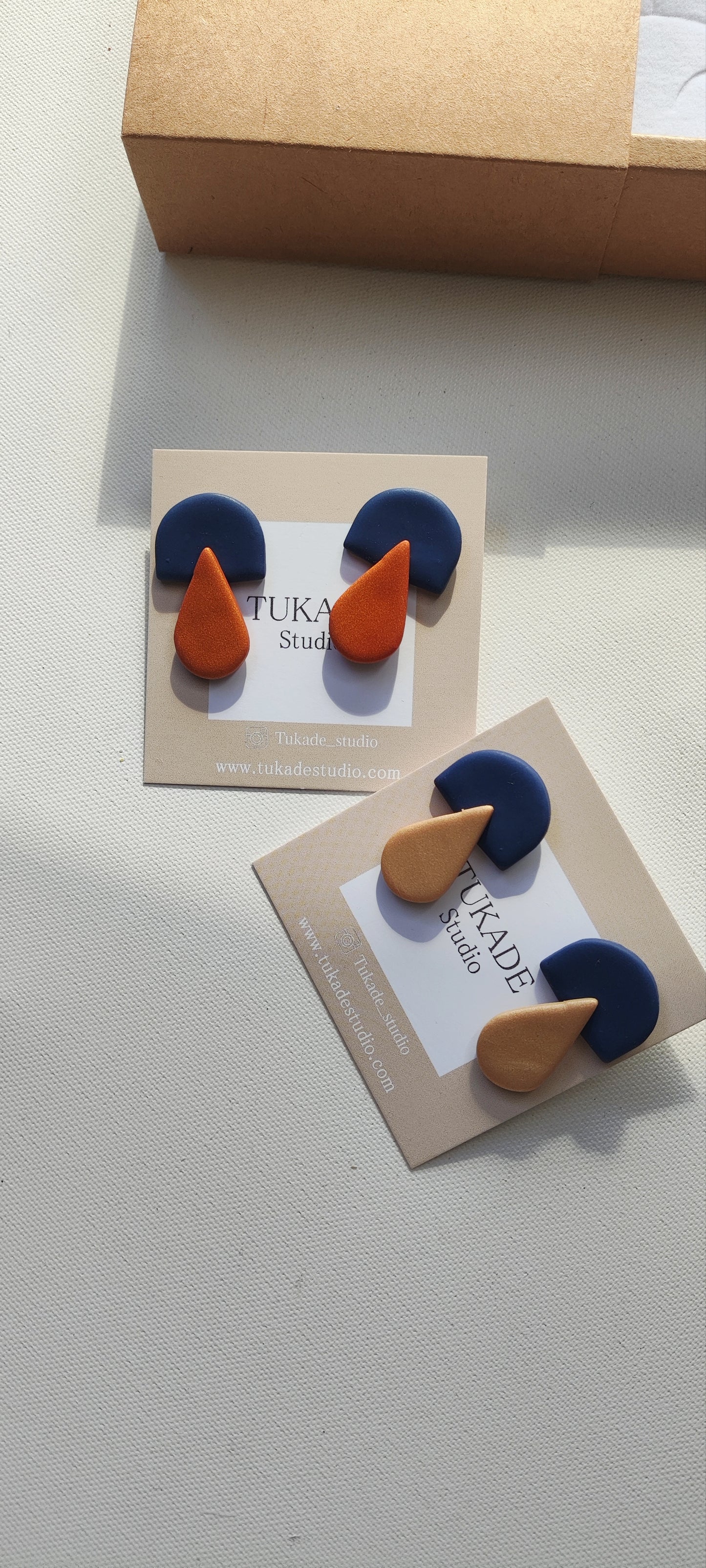 BRUNA azul marino y champán o cobre