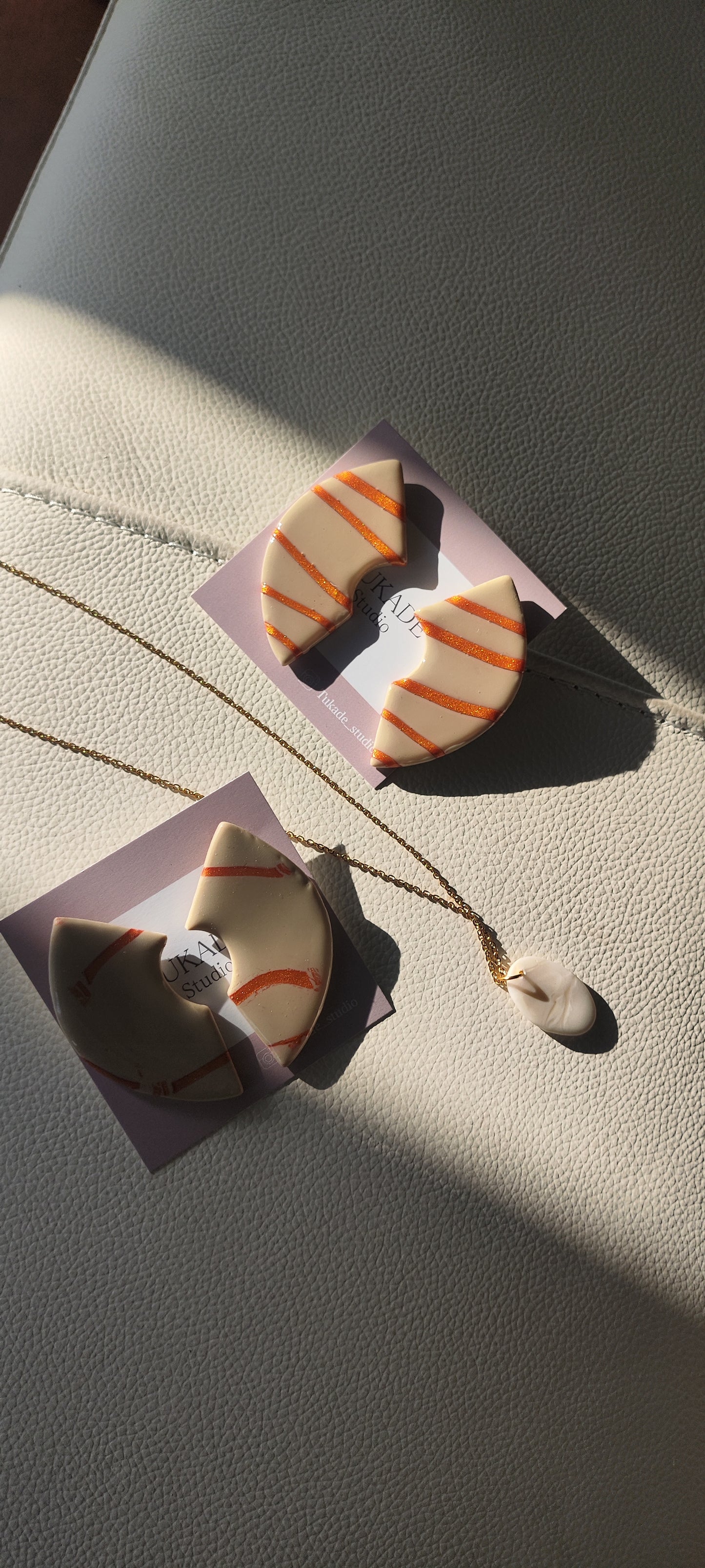 NATI beige y cobre rayas