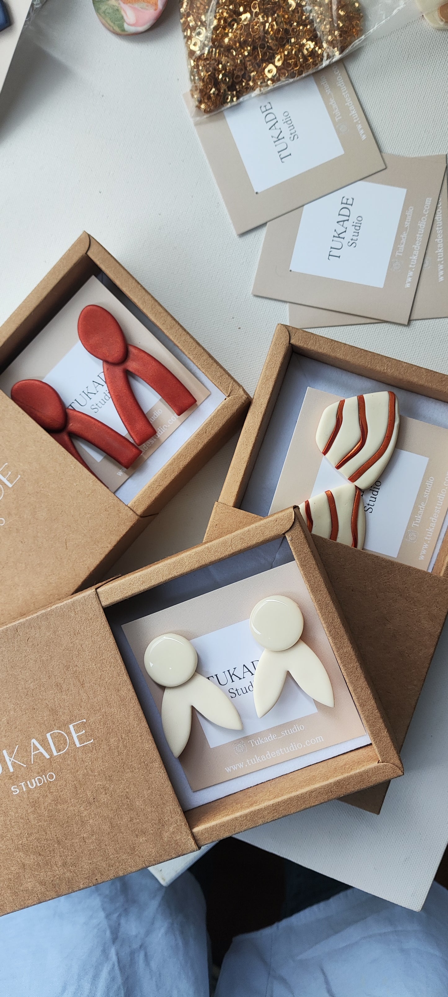 MANOLI rayas crudo y cobre