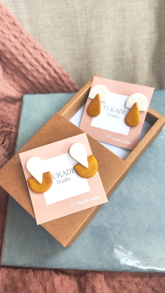 BRUNA ocre-dorado y blanco