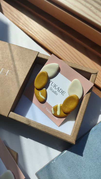 GREGORI ocre dorado y crudo