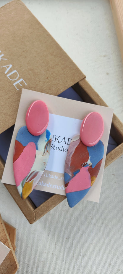 MACA azul, rosa, terracota, ocre
