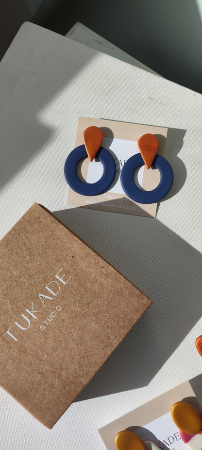 TOMASA azul marino y cobre