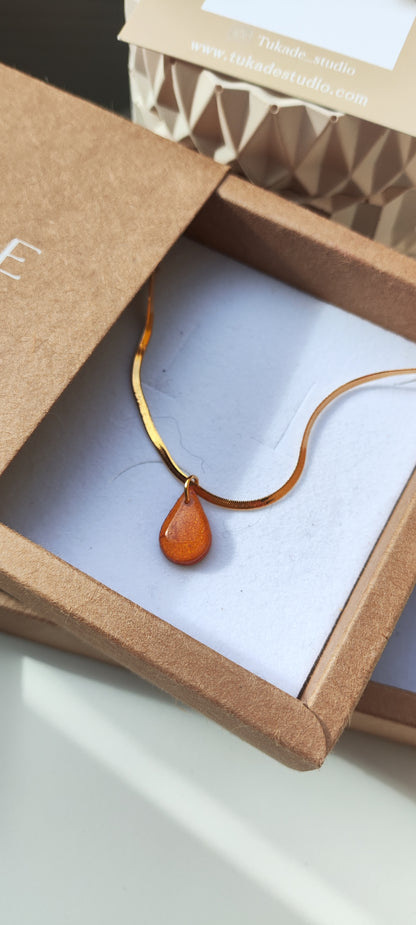 Pack pendientes UMA cobre y collar CUCA cobre