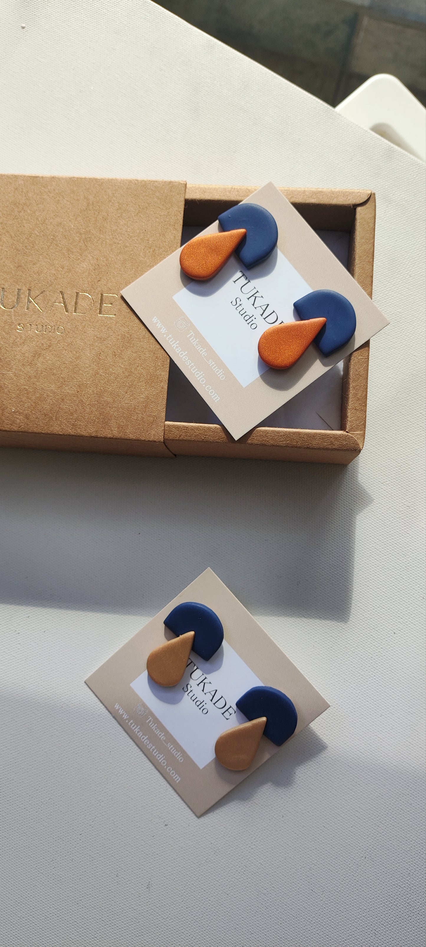 BRUNA azul marino y champán o cobre