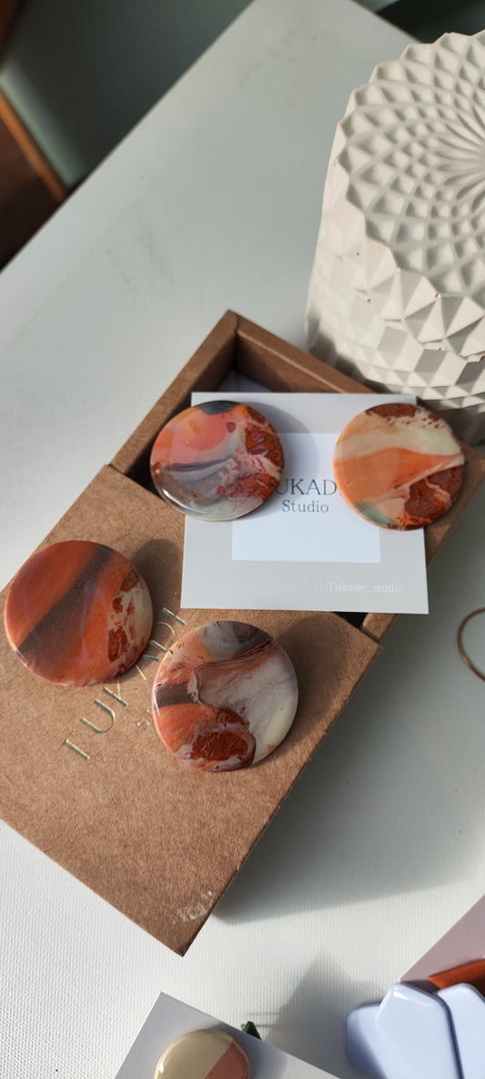 NOAH maxi degradado salmón, plomo, crudo y choco.